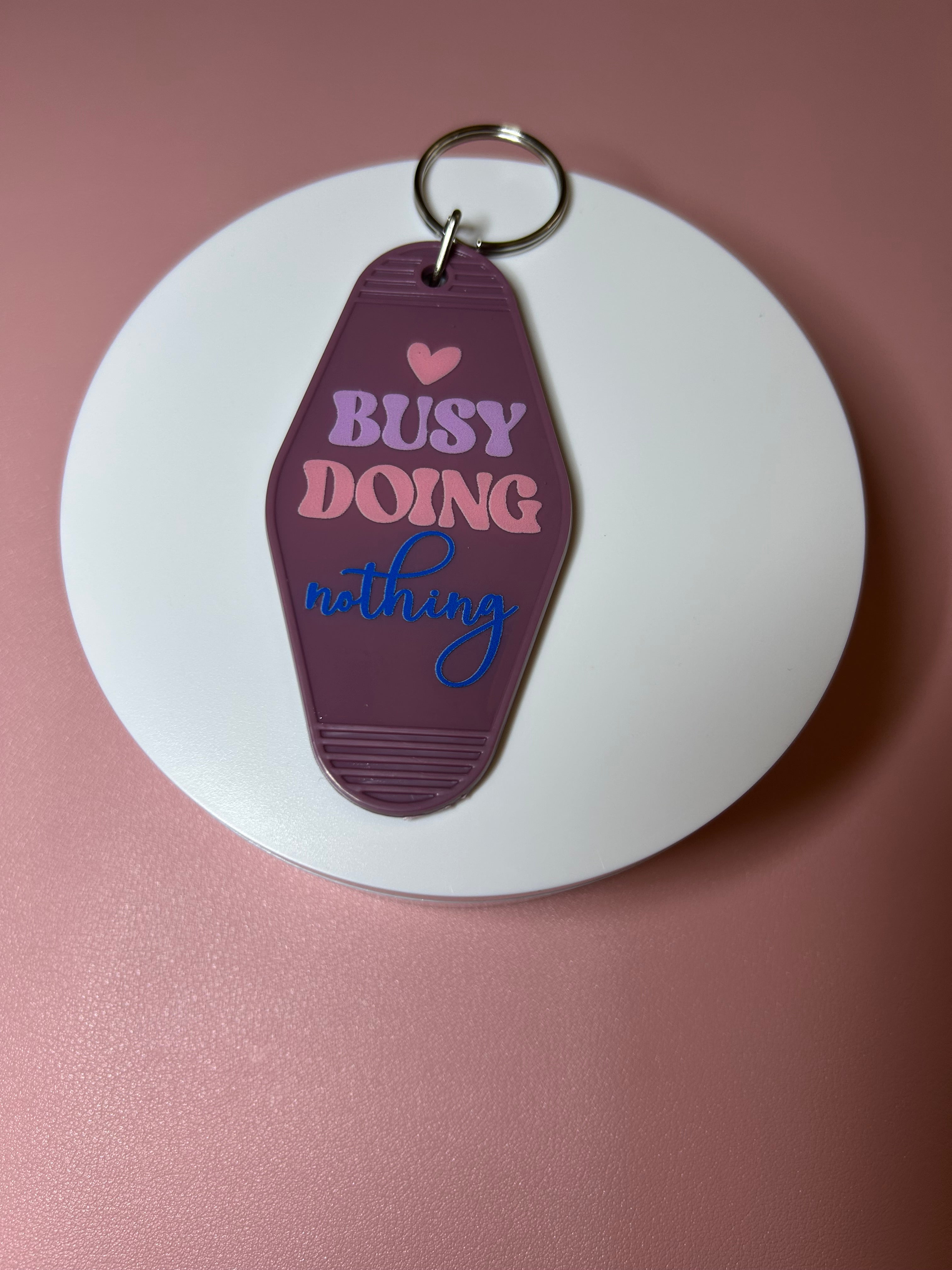 Double sided motel keychain