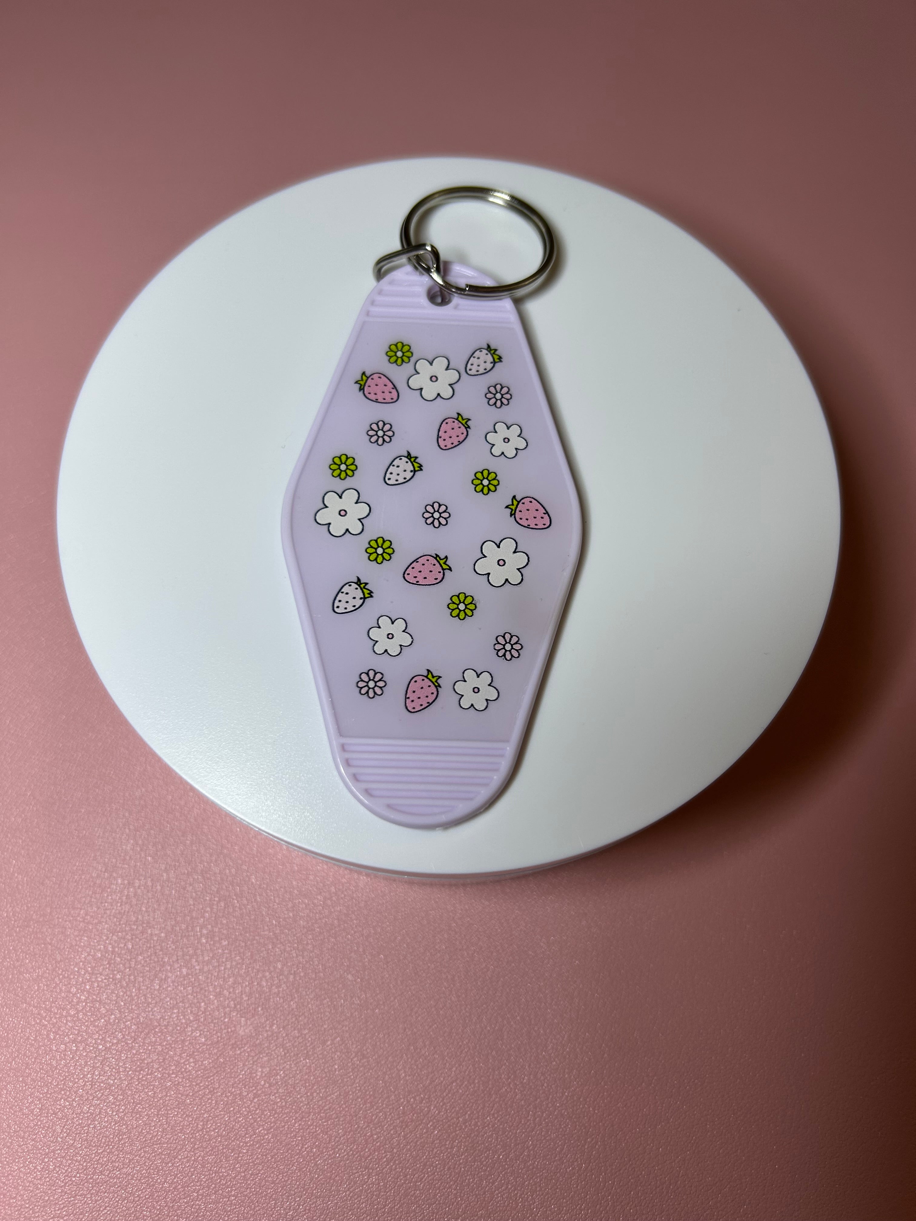 Double sided motel keychain