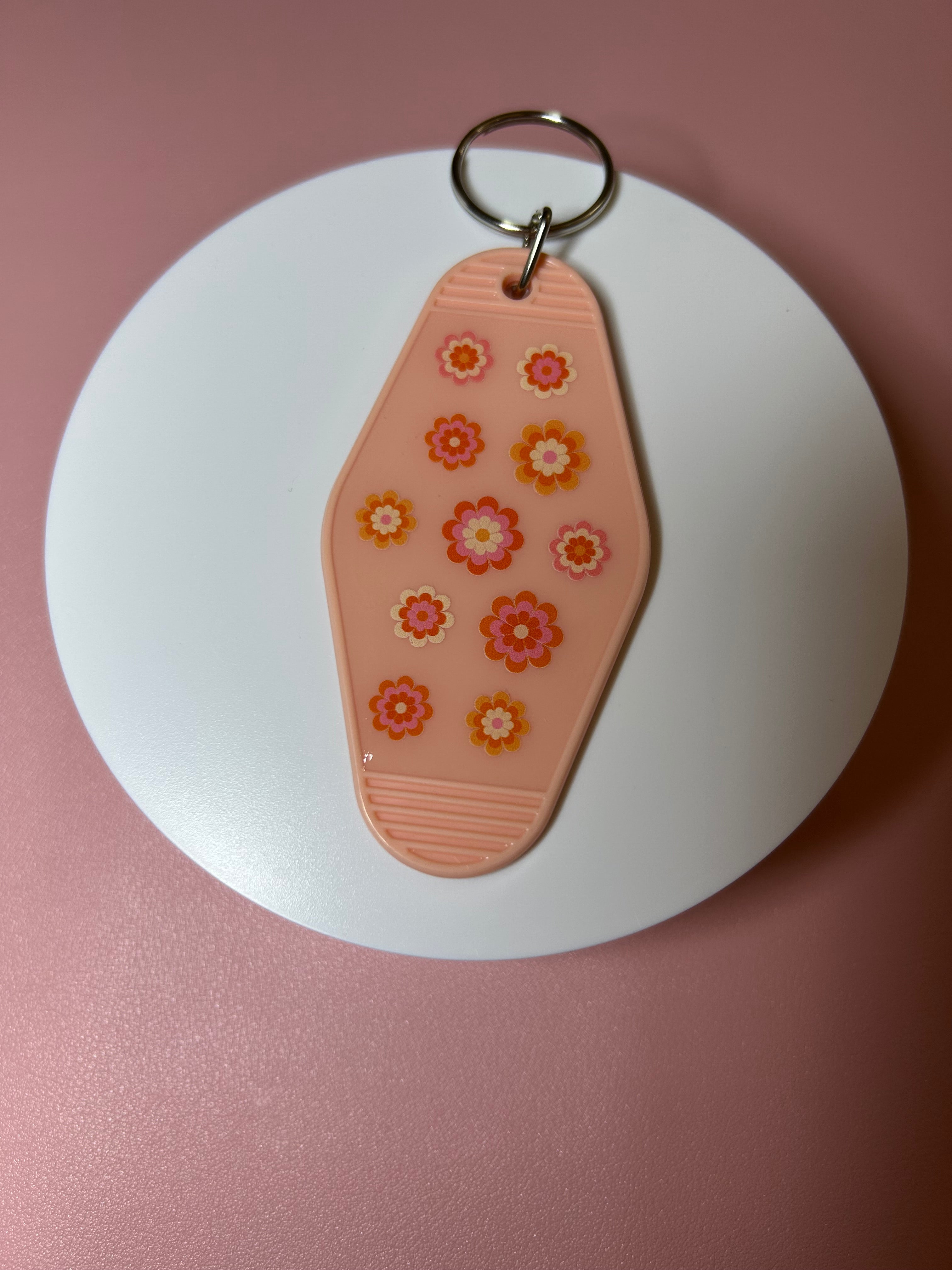 Double sided motel keychain