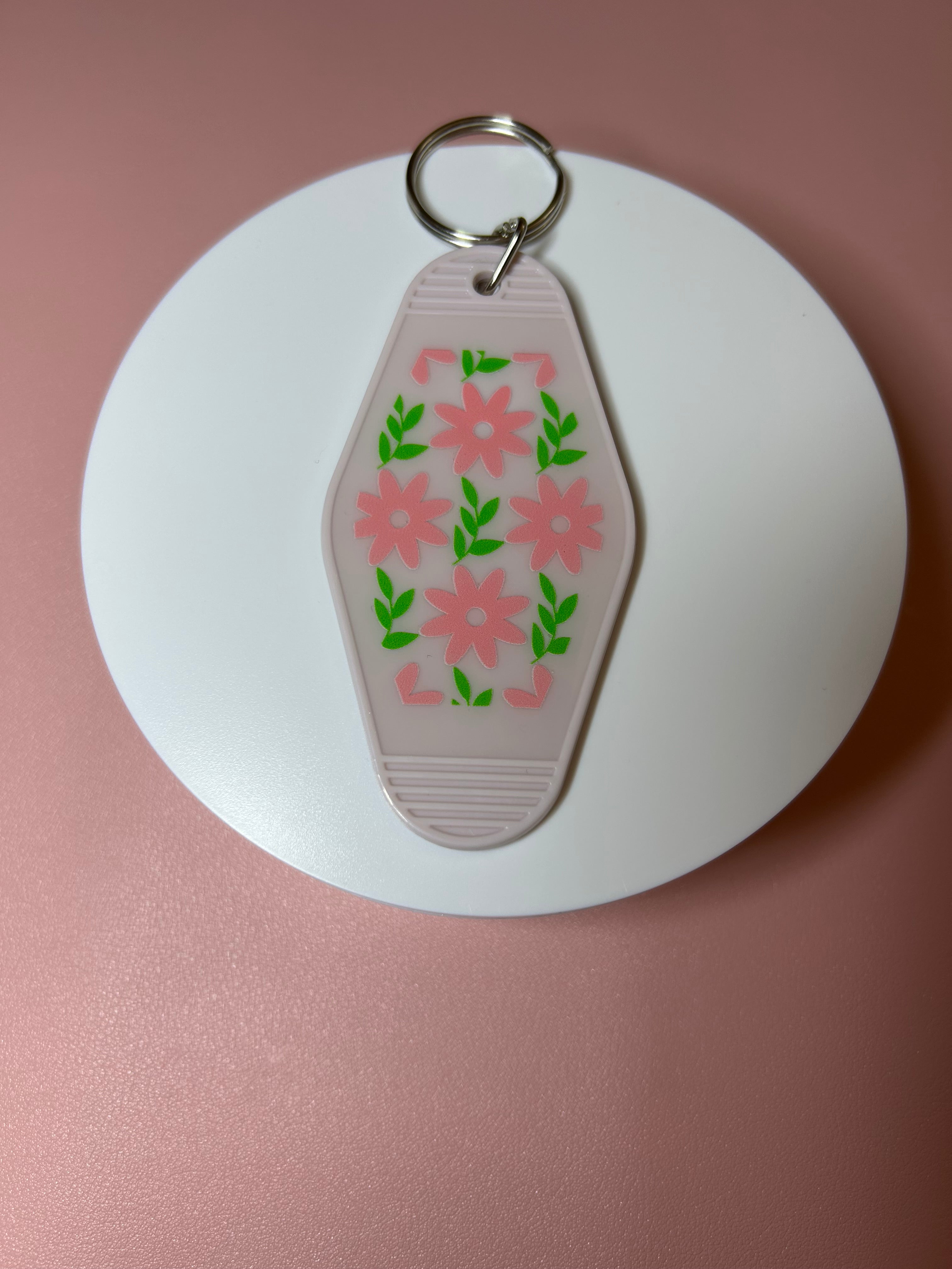 Double sided motel keychain