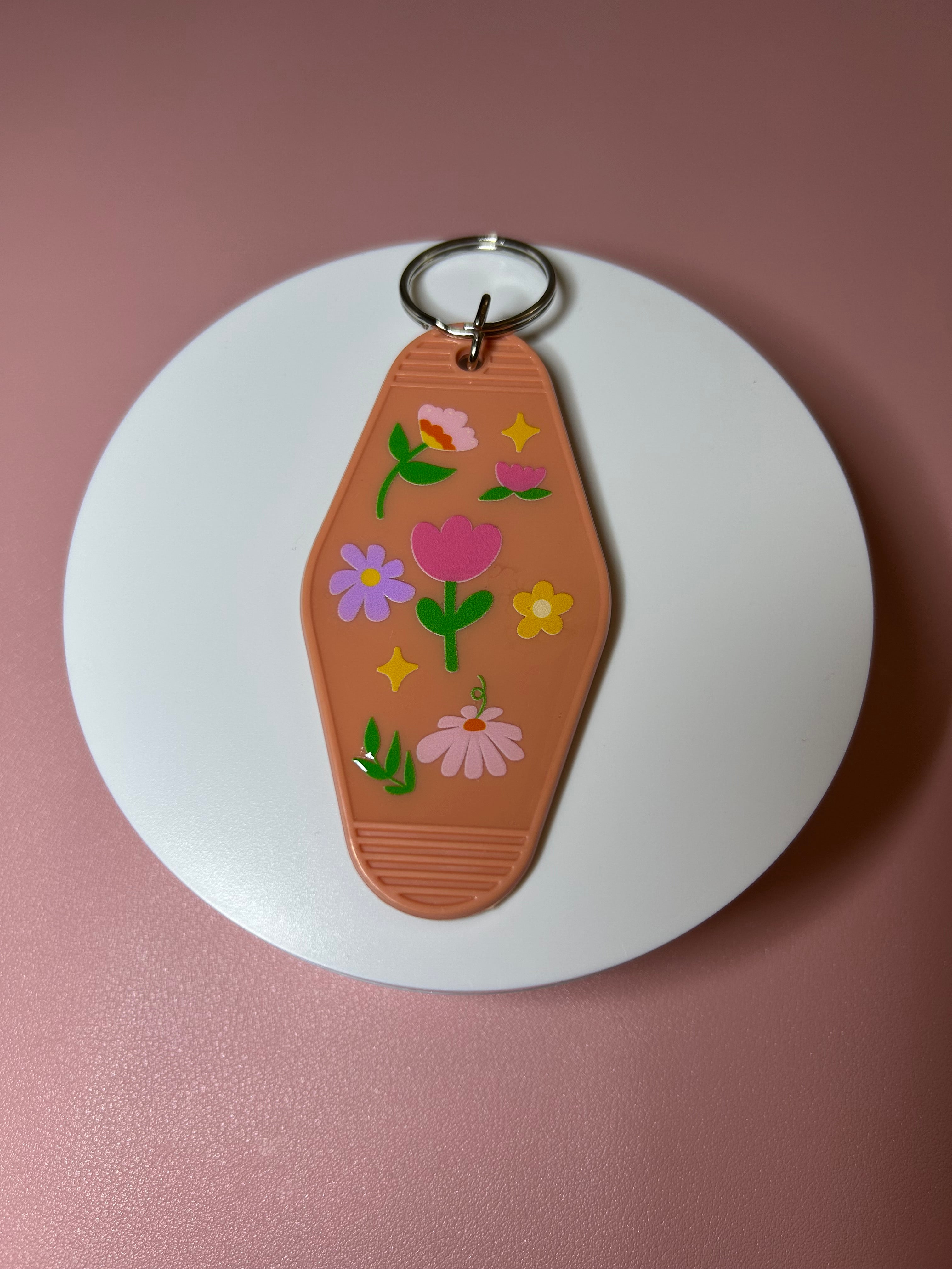Double sided motel keychain