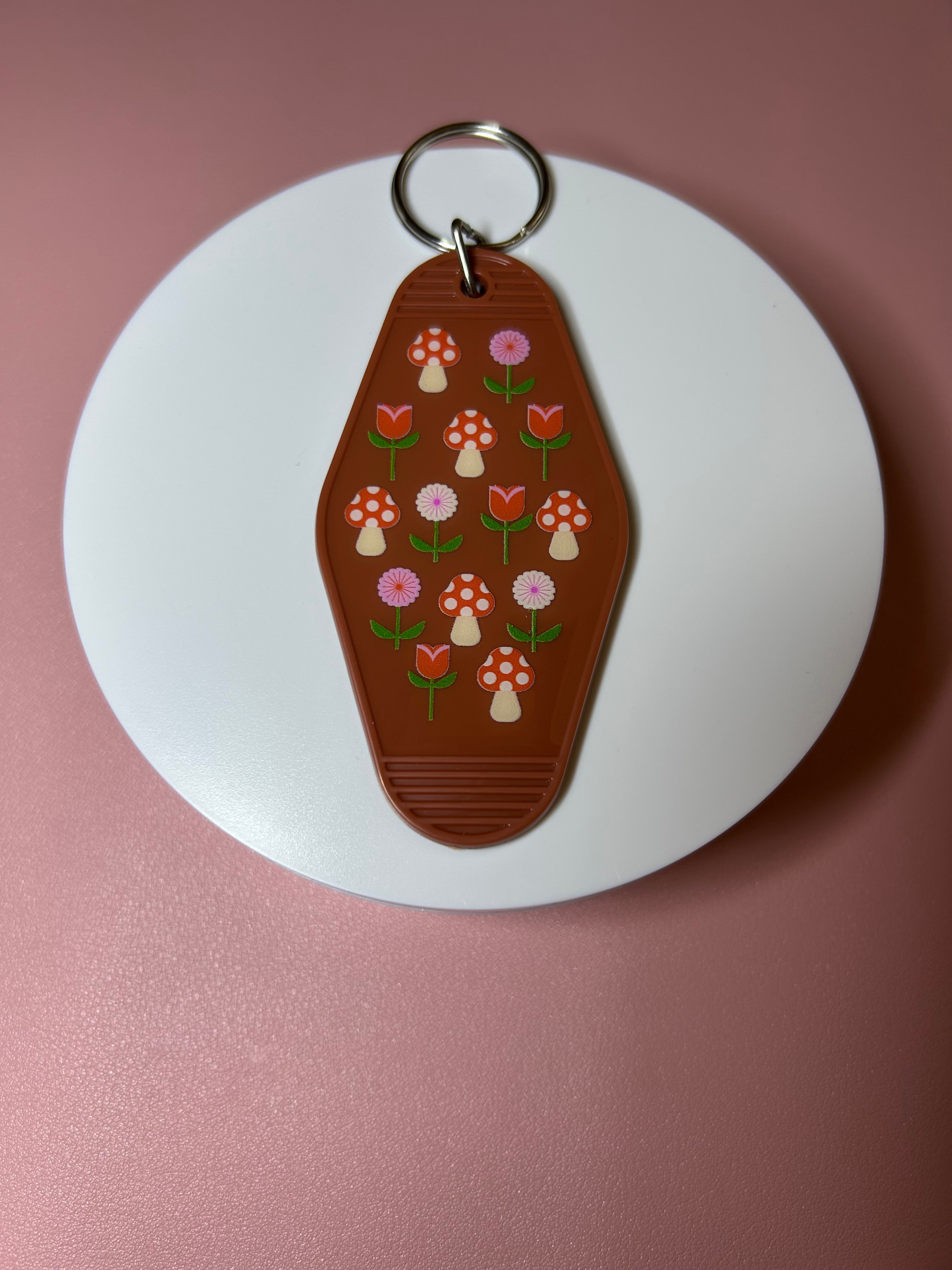 Double sided motel keychain