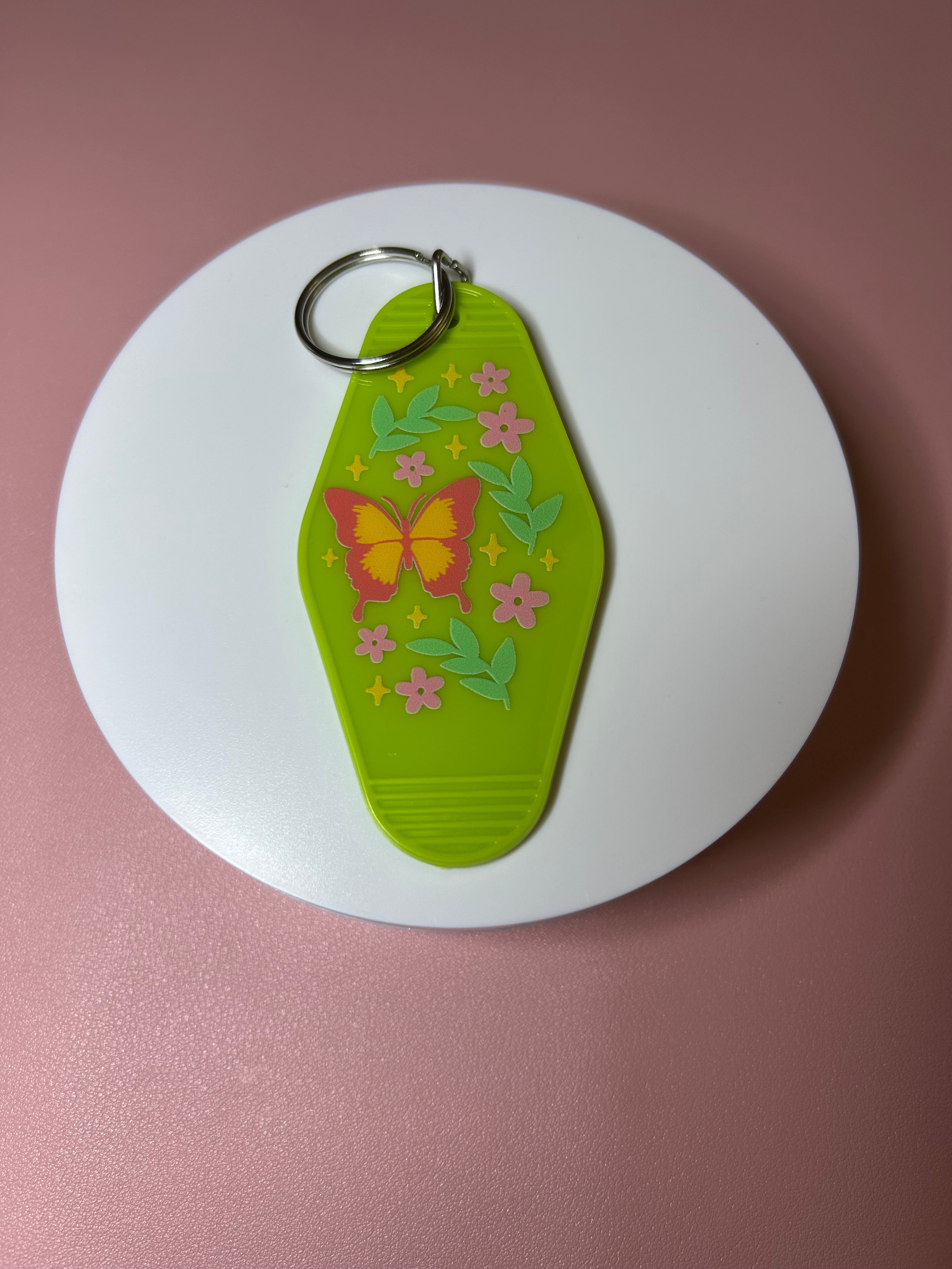 Double sided motel keychain