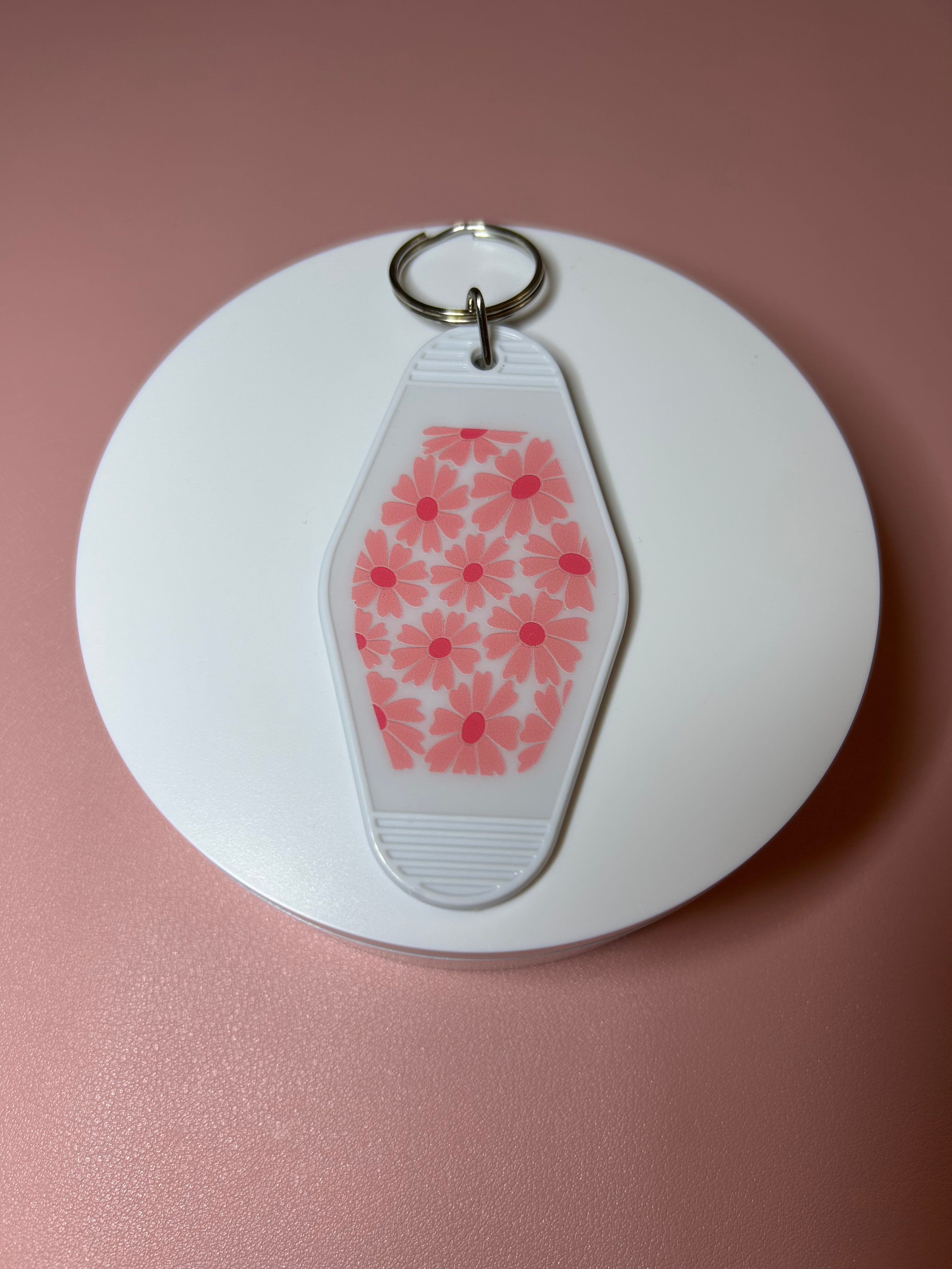 Double sided motel keychain