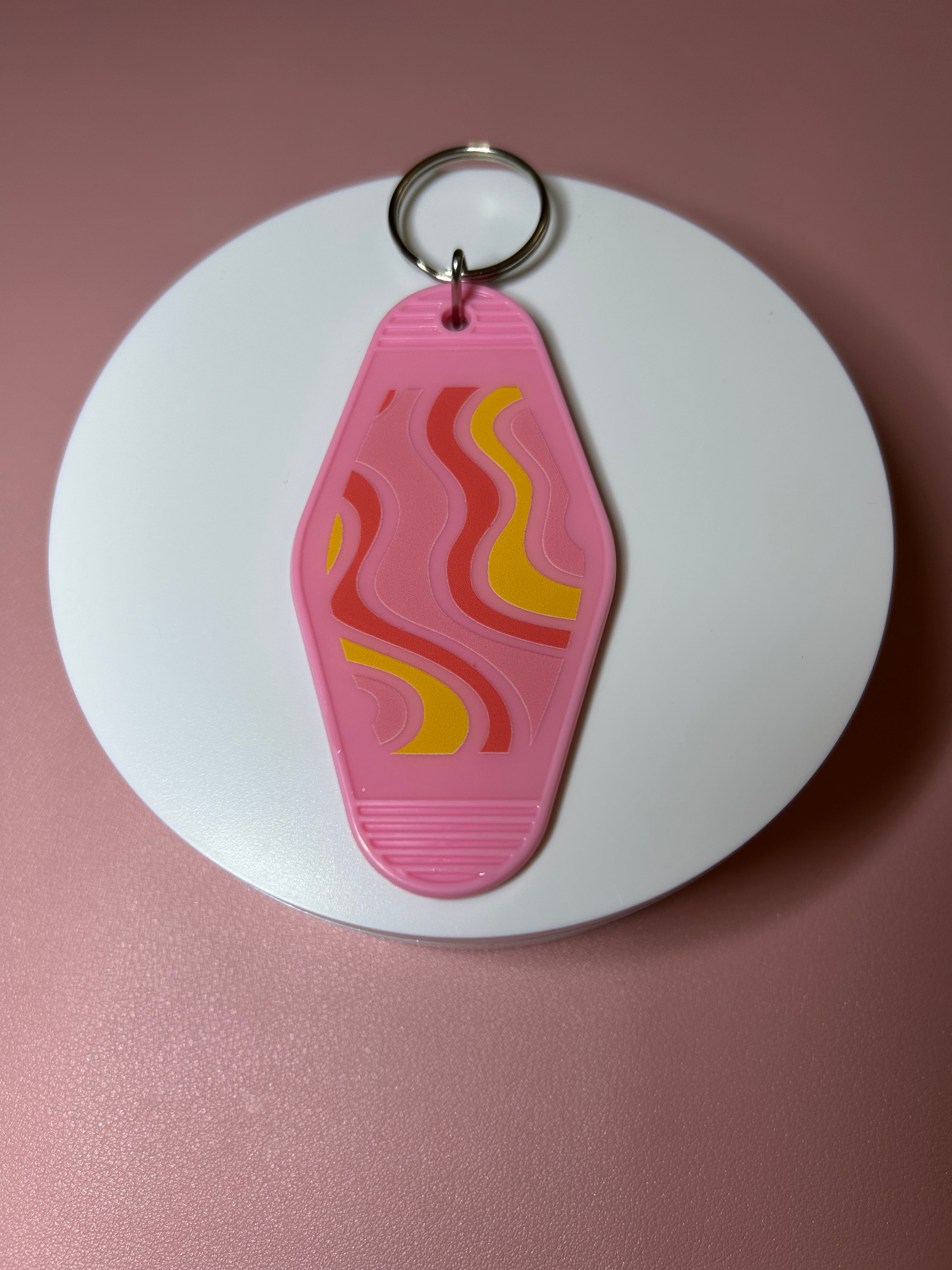 Double sided motel keychain