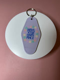 Double sided motel keychain