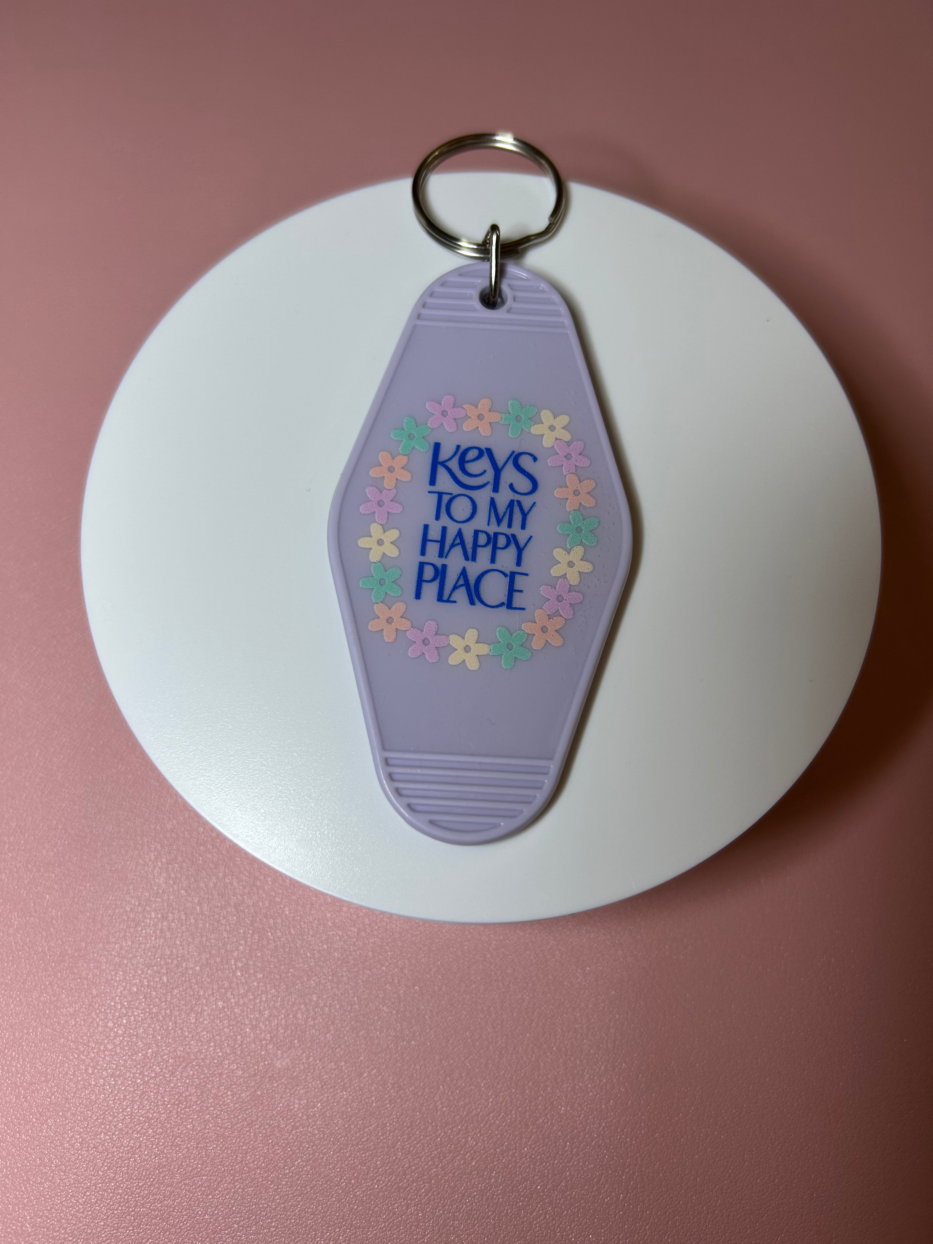 Double sided motel keychain